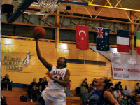 Junior Raisa Taylor takes the basketball to the rim in the Braves’ 72-62 victory over Creighton. Photo by Adam Moulton