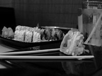 A Tiger Eye sushi roll awaits a customer at Happy Fish, a new sushi restaurant open in CampusTown. The restaurant’s owner was overwhelmed with success its first weekend, so it closed for a few days to regroup. Photo by Megan Loos