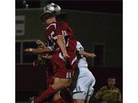 Sophomore Tommy Fritze goes up for a header. The Braves suffered their first losses of the season last weekend. Photo by Megan Loos