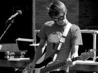A sudent plays a guitar on Olin Quad as part of Jamnesty International last weekend. The concert, put on by Amnesty International, aimed to raise awareness of human suffering across the globe. Photo by Adam Moulton