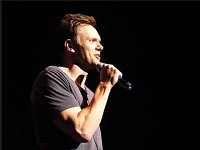 Joel McHale performs last weekend at the Civic Center. The theater was nearly sold out for the popular comedian-turned-TV star. Photo by Megan Loos