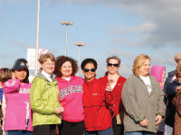 University President Joanne Glasser poses with members of Team Bradley during May’s Susan G. Komen Race for the Cure. The university’s team was comprised of students and staff who joined after Glasser revealed her breast cancer diagnosis to the community last December. Photo courtesy of Bradley University