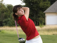 Junior Breanne Neufeld hits a drive at the Payne Stewart Memorial tournament at Missouri State. Neufeld finished second overall. Photo by Megan Loos