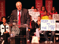 Gov. Pat Quinn addresses students in the Hartmann Center on Thursday. He was here to rally students in support of MAP grant funding. Photo by Adam Moulton