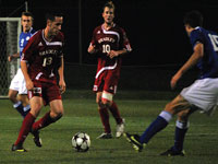 Senior Chris Cutshaw tries to drive around a Creighton defender in the 3-0 loss on Wednesday. Photo by Adam Moulton