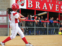 Sophomore outfielder Alison Kresl swings and makes contact with the ball at Laura Bradley Park against Creighton. Photo by Adam Moulton