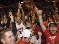 Junior Andrew Warren celebrates amid the student body after the Braves home 68-59 victory over the 18th ranked Northern Iowa Panthers. Photo by Duane Zehr