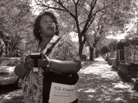 A census worker walks through a neighborhood. Students must fill out the census form for themselves. If they aren’t living at home, they shouldn’t be counted on their parents’ census forms. Photo courtesy of the census public information office