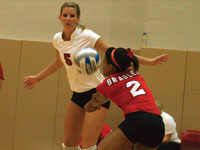 Sophomore Genevieve Dejean keeps the ball alive as her teammates look on during last weekend’s Hotels at Grand Prairie Invitational. Photo by Megan Loos